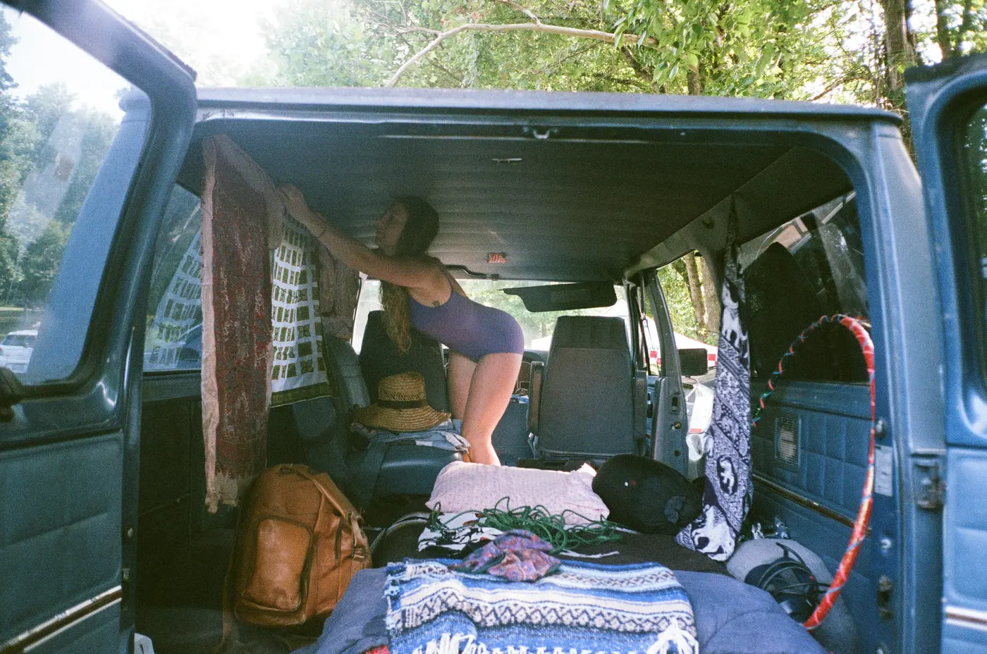 Making up the bed in the camp van