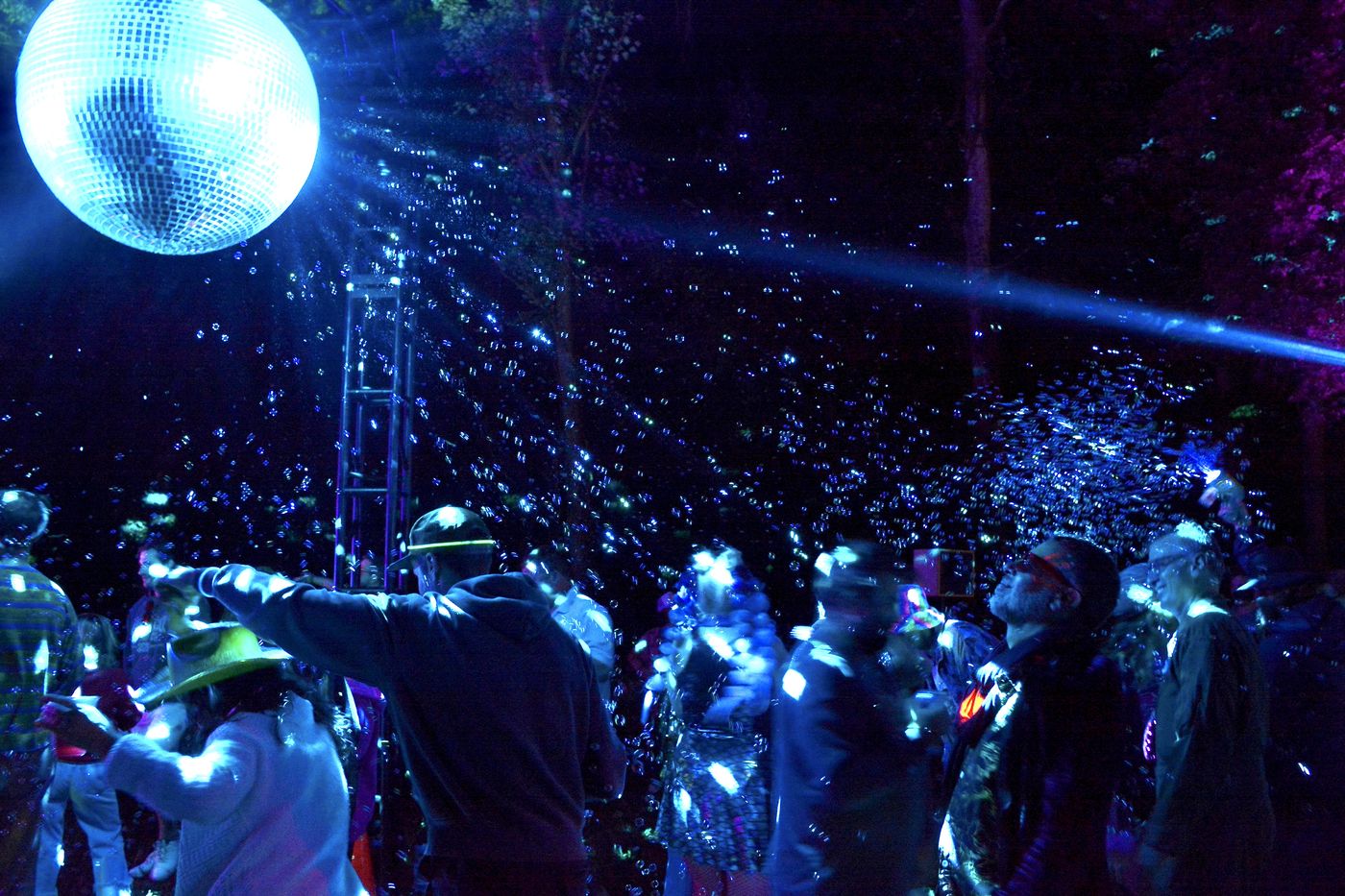 Disco ball over the dance floor at night