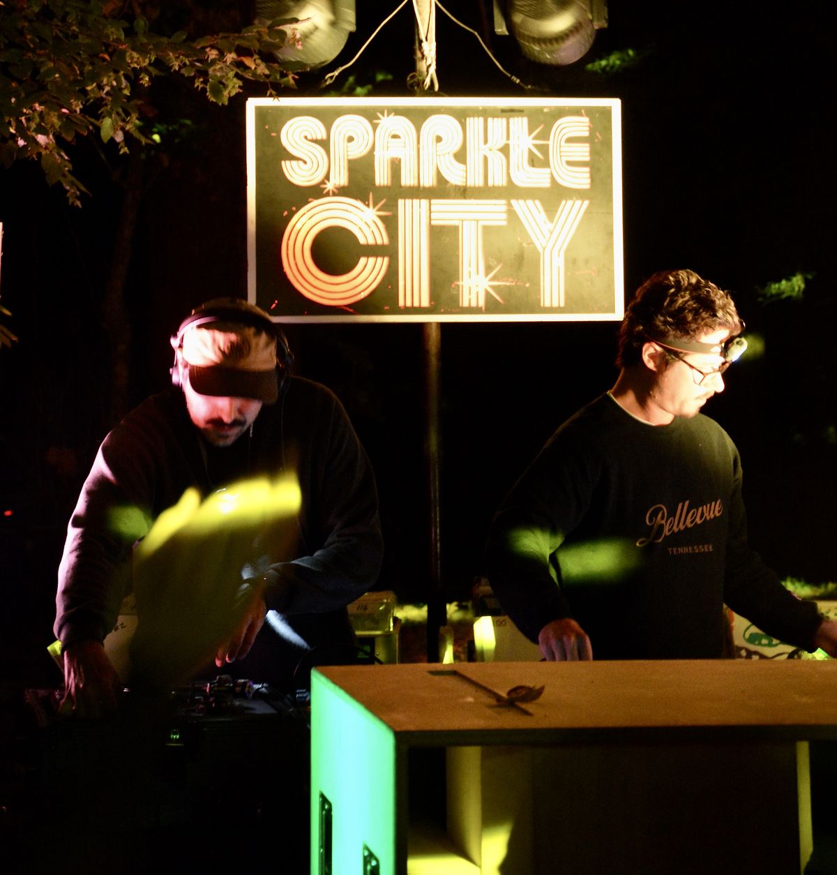 Sparkle City Disco at the decks under the Sparkle City sign